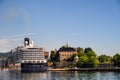 OSLO, NORWAY Ã¢â¬â JULY 12, 2022: Oslo waterfront, view across Oslo Fjord of cruise ship and Akershus Fortress and Castle Royalty Free Stock Photo