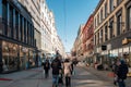 Oslo, Norway - Mar 27 2018 : Norwegian people walking with shopping in historic downtown Royalty Free Stock Photo