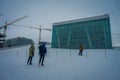 OSLO, NORWAY - MARCH, 26, 2018: eautiful outdoor view of unidentified people skiing at Opera House is the home of The