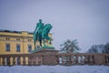 OSLO, NORWAY - MARCH, 26, 2018: Outdoor view of Statue of King Karl Johan outside The Royal Palace in Oslo
