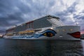 OSLO, NORWAY - MAY 27, 2025: Large cruise ship AIDAnova docked at the port of Oslo under a dramatic cloudy sky Royalty Free Stock Photo