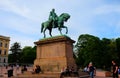 People visiting and enjoying at the statue of King Karl Johan XIV in Oslo