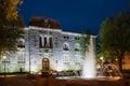 Oslo, Norway. Night View Of Old Bank Building And Fountain In Bank Square Royalty Free Stock Photo