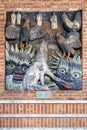 Oslo, Norway - Nordic mythology motives of Garm and Ragnarok in exterior decorations of City Hall historic building - Radhuset -