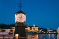 Oslo. Norway. Old Clock at Aker Brygge In Oslo Embankment, Norway. Night View Of Famous And Popular Place Royalty Free Stock Photo
