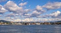 Oslo, Norway - Panoramic view of Oslo waterfront with Akershus Fortress, City Hall and Aker Brygge borough at Pipervika harbor Royalty Free Stock Photo