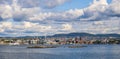 Oslo, Norway - Panoramic view of Oslo waterfront with Akershus Fortress, City Hall and Aker Brygge borough at Pipervika harbor Royalty Free Stock Photo