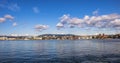 Oslo, Norway - Panoramic view of Oslo waterfront with City Hall, Aker Brygge and Tjuvholmen borough at Pipervika harbor Royalty Free Stock Photo