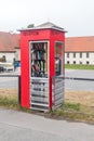Telephone box with free book library Royalty Free Stock Photo