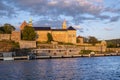 Oslo, Norway - Sunset view of medieval Akershus Fortress - Akershus Festning - historic royal residence at Oslofjorden sea shore Royalty Free Stock Photo