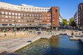 Oslo, Ostlandet / Norway - 2019/08/30: Fridtjof Nansens plass square in front of Oslo City Hall historic building - Radhuset - in Royalty Free Stock Photo