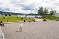 Oslo people on harbour beach Aker Brygge Royalty Free Stock Photo