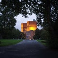 Oslo Town Hall, Norway in the evening. Bell Tower. Trees. Evening. Royalty Free Stock Photo