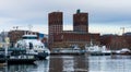 Norway April 07/2021 View of Oslo City Hall from Aker Brygge Royalty Free Stock Photo