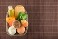 ÃÂ¡osmetic bath products in the basket on a bamboo placemat Royalty Free Stock Photo