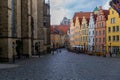 OsnabrÃÂ¼ck, Lower Saxony, Germany, June 5, 2021. St. Marien church and facedes of old houses on the Market square in the Royalty Free Stock Photo