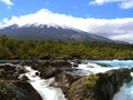 Osorno volcano and the Petrohue Falls- Saltos de PetrohuÃÂ© in Chile Royalty Free Stock Photo