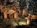 Nativity scene made with hand-carved wooden figurines Royalty Free Stock Photo