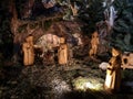 Nativity scene made with hand-carved wooden figurines Royalty Free Stock Photo