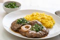 Ossobuco alla Milanese with saffron risotto, typical Lombard cuisine