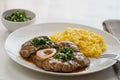 Ossobuco alla Milanese with saffron risotto, typical Lombard cuisine