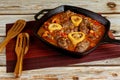 Ossobuco italian dish with beef shank, bell pepper, onion and wine Royalty Free Stock Photo