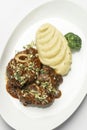 Ossobuco veal shanks with red wine gravy sauce Royalty Free Stock Photo