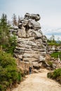 Ostas Nature Reserve and table mountain,Broumov region,Czech republic.Female backpacker in romantic rocky canynon enjoying view of