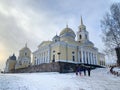 Ostashkov, Russia, January, 07, 2020. People walking near Epiphany Cathedral in Nilo-Stolobenskaya Nilova hermitage in winter on