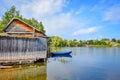 Fisherman wooden house with a boat in Ostashkov Royalty Free Stock Photo