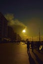 Ostend, Belgium: unidentifiable people walking on the pier