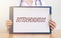 Osteochondrosis word, inscription. Medical disease Royalty Free Stock Photo