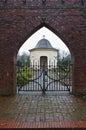 Osterholz-Scharmbeck, Germany - December 3rd, 2017 - View through the churchyard gate towards the funeral chapel