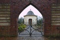 Osterholz-Scharmbeck, Germany - December 3rd, 2017 - View through the churchyard gate towards the funeral chapel