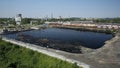 OSTRAVA, CZECH REPUBLIC, AUGUST 3, 2015: Former dump toxic waste, oil lagoon contamination water and soil