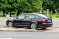 Black sport Skoda Octavia RS car of 2nd generation in liftback facelifted version