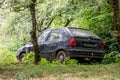 The wreck of old blue Skoda Felicia LXi hatchback car with rust
