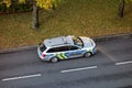 Silver Skoda Octavia Combi police car of Policie Ceske Republiky PCR parked in the middle of a road