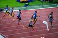 Accelerating through the Curve: Men's 200m Race Unfolds on the Track and Field Stage for Worlds Royalty Free Stock Photo