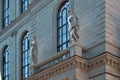 Ostrovsky Square 2a, Saint Petersburg, Russia, 11.10.2020. Ancient sculpture, nymphs stands on balcony of facade