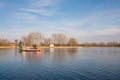 A ferry across the Goplo postglacial channel lake, close to Kruszwica in the Kuyavian district. Royalty Free Stock Photo