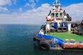 OSV boat, offshore supply vessel stand moored in harbor Royalty Free Stock Photo