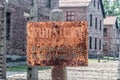 Electrified fence warning sign at Auschwitz I, Former German Nazi Concentration and Extermination Camp Royalty Free Stock Photo