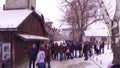 OSWIENCIM, POLAND - JANUARY, 14, 2017 Guided tour near entrance to Auschwitz Birkenau, German Nazi concentration and Royalty Free Stock Photo