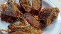 Otak otak bandeng. Take the milkfish meat, then mix the meat with the spices then put the meat back into the fish skin.