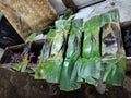 Otak otak ikan, traditional indonesian grilled fish cake wrapped in banana leaf. Royalty Free Stock Photo