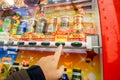 Hand of one people pressing to buy canned soft drink