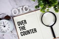 OTC - Over The Counter acronym on notepad, Business concept background Royalty Free Stock Photo