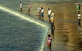 Rural India - People Fishing Near a Dam. Royalty Free Stock Photo