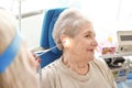 Otolaryngologist examining senior woman\'s ear with ENT telescope in hospital Royalty Free Stock Photo